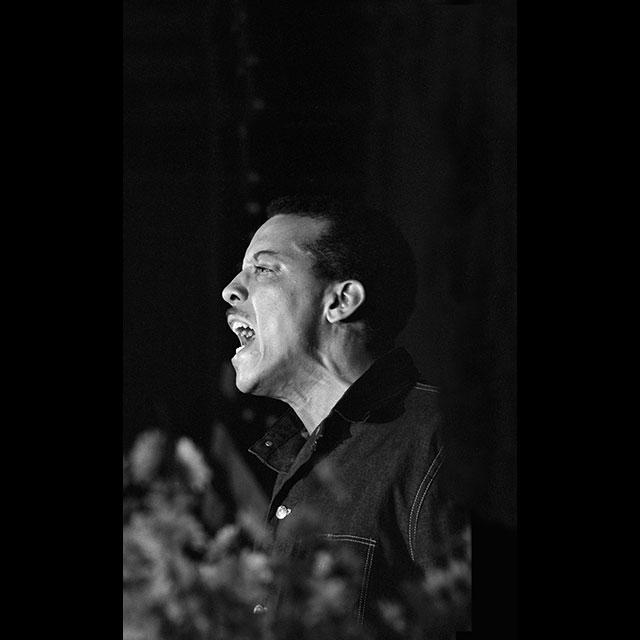 A black and white photograph of Dave Dennis at James Chaney’s funeral 