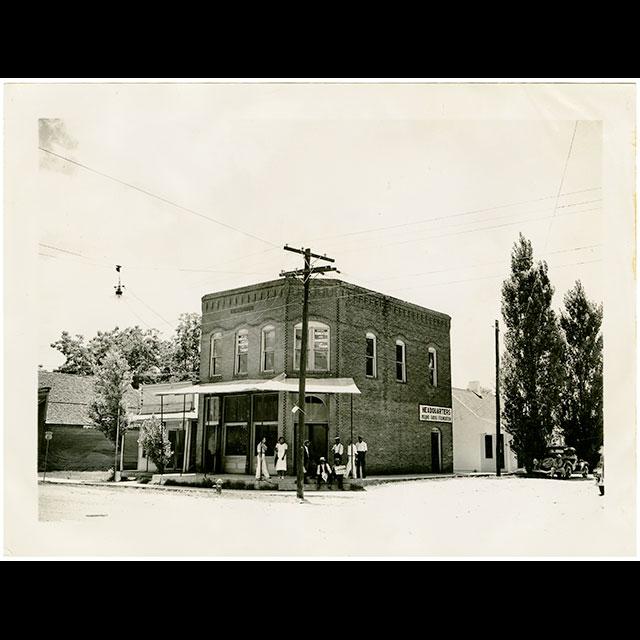 A black and white photograph of the Mound Bayou Headquarters building