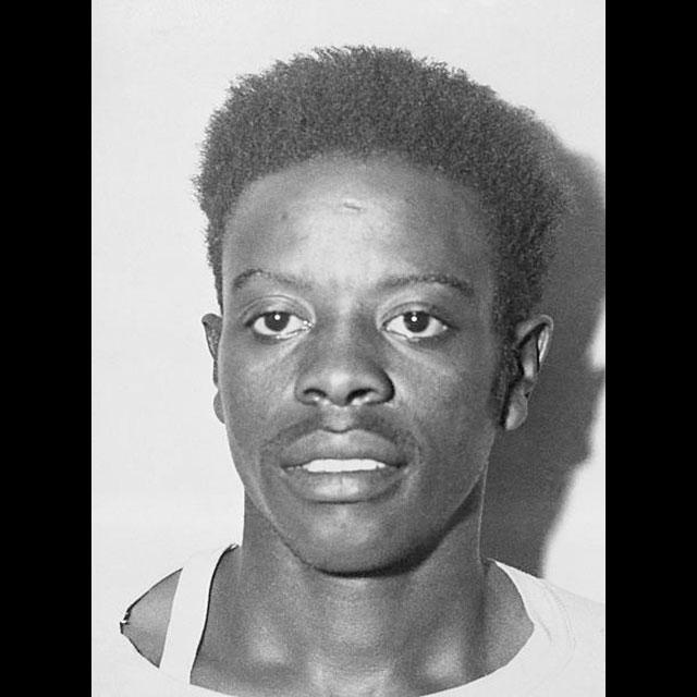 A black and white headshot of Mack Charles Parker