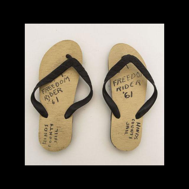 A color image of a pair of rubber flip flops worn by Freedom Rider Joan Trumpauer during her time in Hinds County Jail